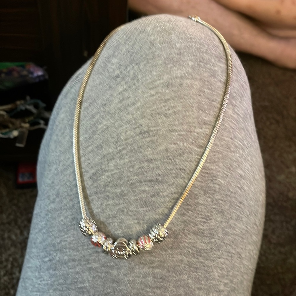 Buckeye pandora necklace. She should have put Fake!